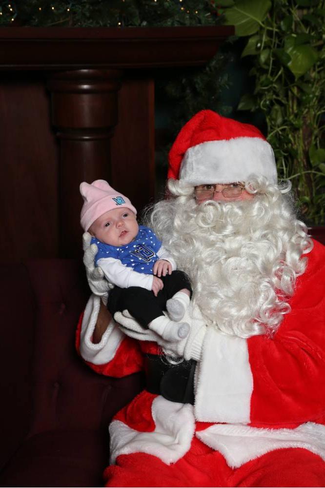 Littlest Laker poses with Santa